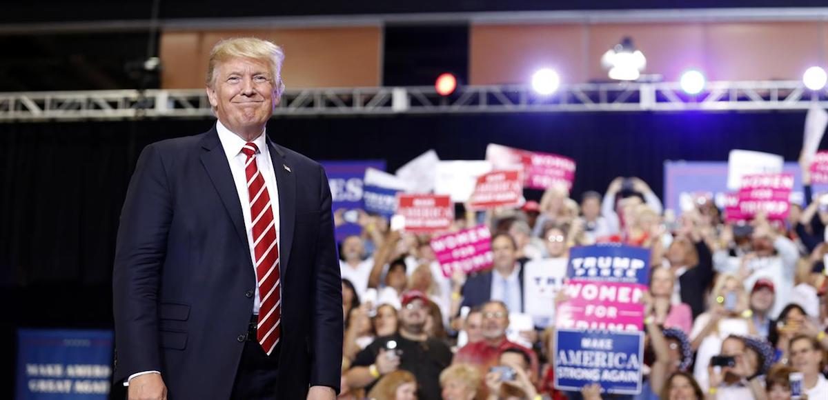 President Donald Trump stands before speaking at a rally at the Phoenix Convention Center, Tuesday, Aug. 22, 2017, in Phoenix. (Photo: AP)