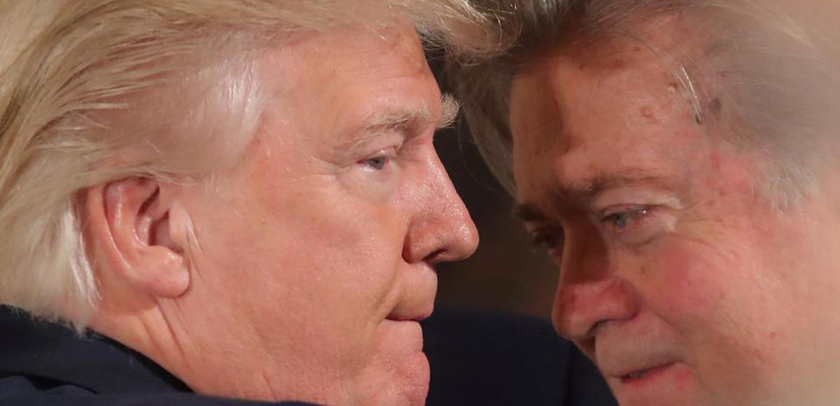 President Donald Trump talks to chief strategist Steve Bannon during a swearing-in ceremony for senior staff at the White House on January 22. (Photo: Reuters)