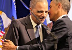 U.S. President Barack Obama greets outgoing U.S. Attorney General Eric Holder at Holder's portrait unveiling ceremony at The Department of Justice in Washington, DC, February 27, 2015. (Photo: AP)