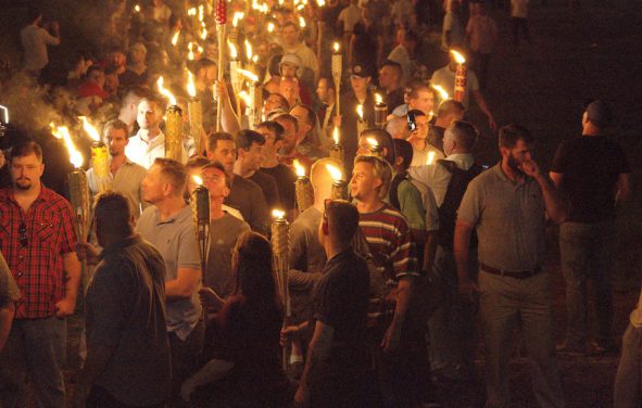 White nationalists carry torches on the grounds of the University of Virginia, on the eve of a planned Unite The Right rally in Charlottesville, Virginia. (Photo: Reuters)