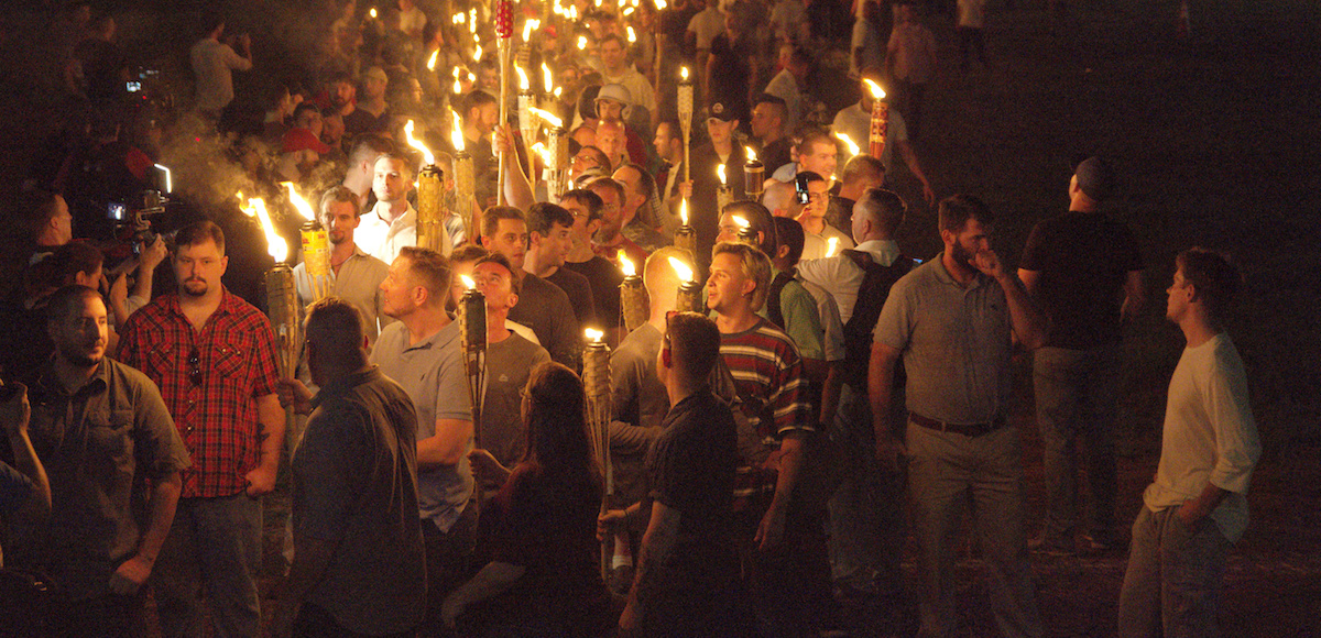 White nationalists carry torches on the grounds of the University of Virginia, on the eve of a planned Unite The Right rally in Charlottesville, Virginia. (Photo: Reuters)