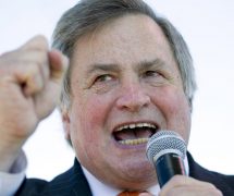 In this Sept. 12, 2010 file photo, political commentator Dick Morris speaks to the crowd during the 