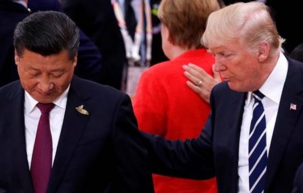 U.S. President Donald Trump talks to Chinese President Xi Jinping during the G20 leaders summit in Hamburg, Germany July 7, 2017. (Photo: Reuters)