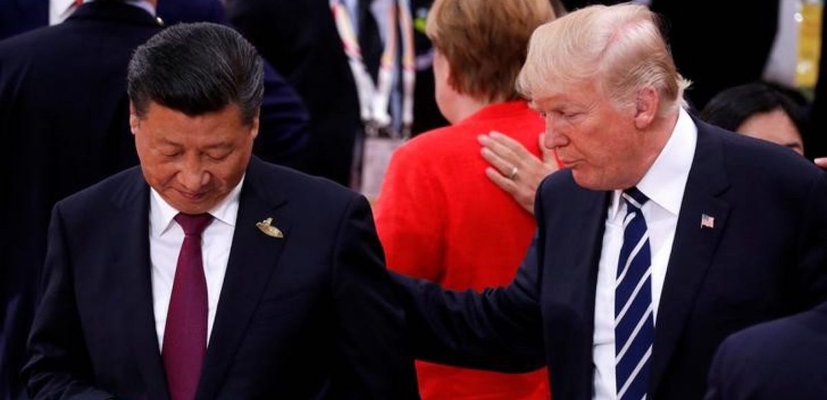 U.S. President Donald Trump talks to Chinese President Xi Jinping during the G20 leaders summit in Hamburg, Germany July 7, 2017. (Photo: Reuters)