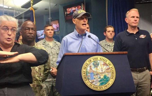 Florida Governor Rick Scott meets with his team and officials in preparation for Hurricane Irma in Tallahassee on September 7, 2017.