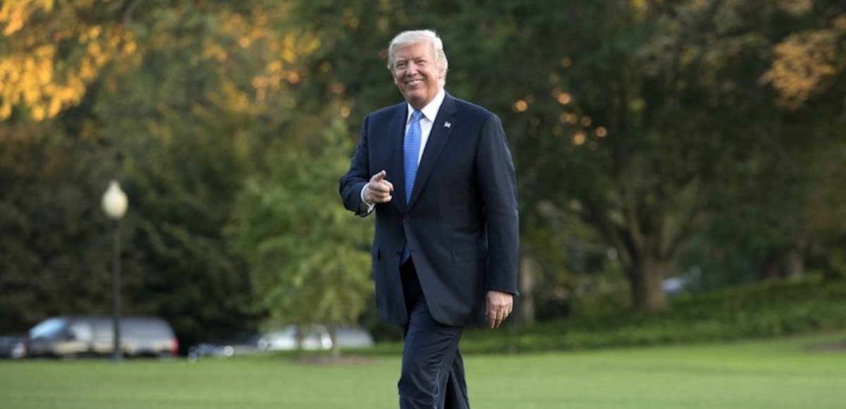 President Donald Trump walks from Marine One across the South Lawn of the White House in Washington, Wednesday, Sept. 27, 2017, as he returns from Indianapolis. (Photo: AP)