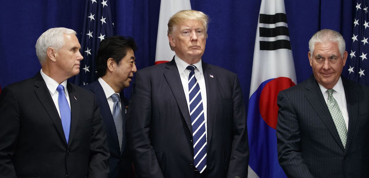 Japanese Prime Minister Shinzo Abe walks to his seat at a luncheon with President Donald Trump and South Korean President Moon Jae-in at the Palace Hotel during the United Nations General Assembly, Thursday, Sept. 21, 2017, in New York. From left, Vice President Mike Pence, Abe, Trump, and Secretary of State Rex Tillerson. (Photo: AP Photo)