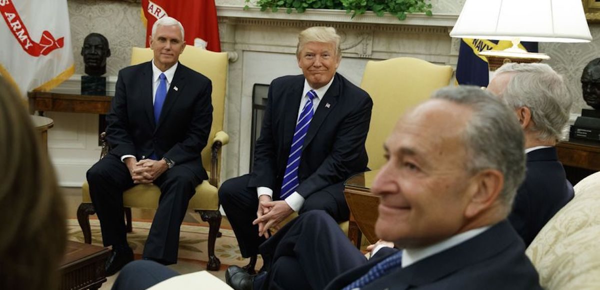 Vice President Mike Pence looks on with President Donald Trump during a meeting with Senate Minority Leader Chuck Schumer, D-N.Y., and other Congressional leaders in the Oval Office of the White House, Wednesday, Sept. 6, 2017, in Washington. (Photo: AP)