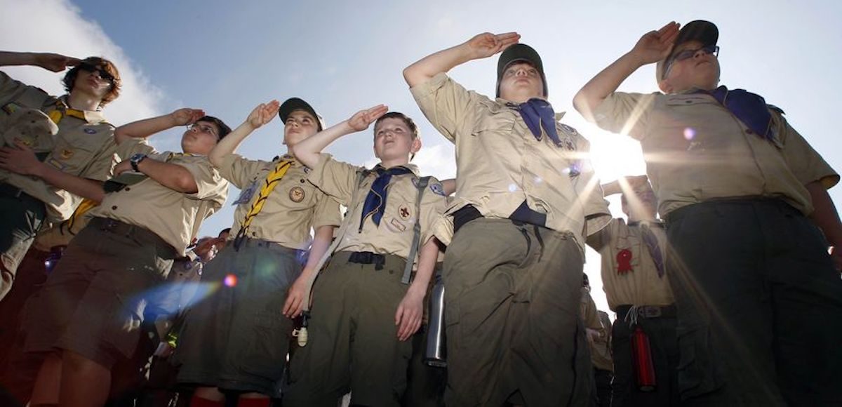 Boy Scouts of America salute during a "camporee" in Sea Girt, N.J., on Saturday morning, May 21, 2011. On Wednesday, October 11, 2017 Boy Scouts of America announced it would admit girls throughout its ranks, a move that will transform what has been a mostly cordial relationship between the two iconic youth groups since the Girl Scouts of the USA was founded in 1912, two years after the Boy Scouts. (Photo: AP)