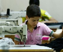 Muhamed Awwal, a 13-year-old from Syria, works in his father's basement factory in Istanbul. Around 665,000 school-age Syrian children who live in Turkey are not in school. (Photo: Syria)