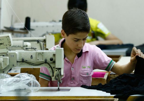 Muhamed Awwal, a 13-year-old from Syria, works in his father's basement factory in Istanbul. Around 665,000 school-age Syrian children who live in Turkey are not in school. (Photo: Syria)