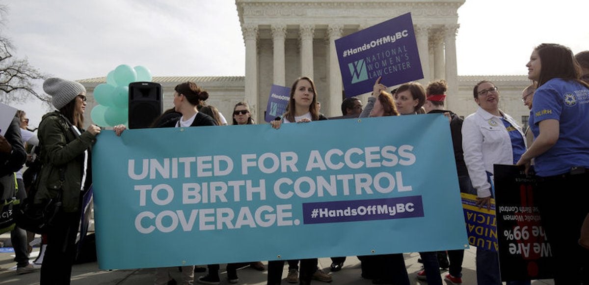 FILE PHOTO: Supporters of contraception rally before Zubik v. Burwell is heard by the U.S. Supreme Court in Washington, D.C. (Photo: Reuters)