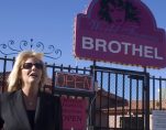 Susan Austin, the madam at the Wild Horse Adult Resort & Spa outside Reno, poses outside the World Famous Brothel in Nevada. (Photo: Reuters)