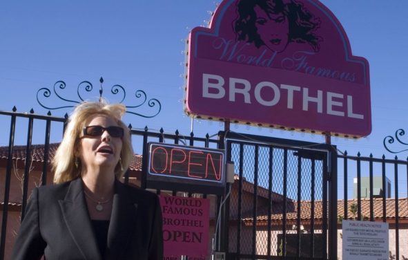 Susan Austin, the madam at the Wild Horse Adult Resort & Spa outside Reno, poses outside the World Famous Brothel in Nevada. (Photo: Reuters)