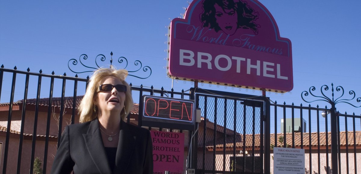 Susan Austin, the madam at the Wild Horse Adult Resort & Spa outside Reno, poses outside the World Famous Brothel in Nevada. (Photo: Reuters)