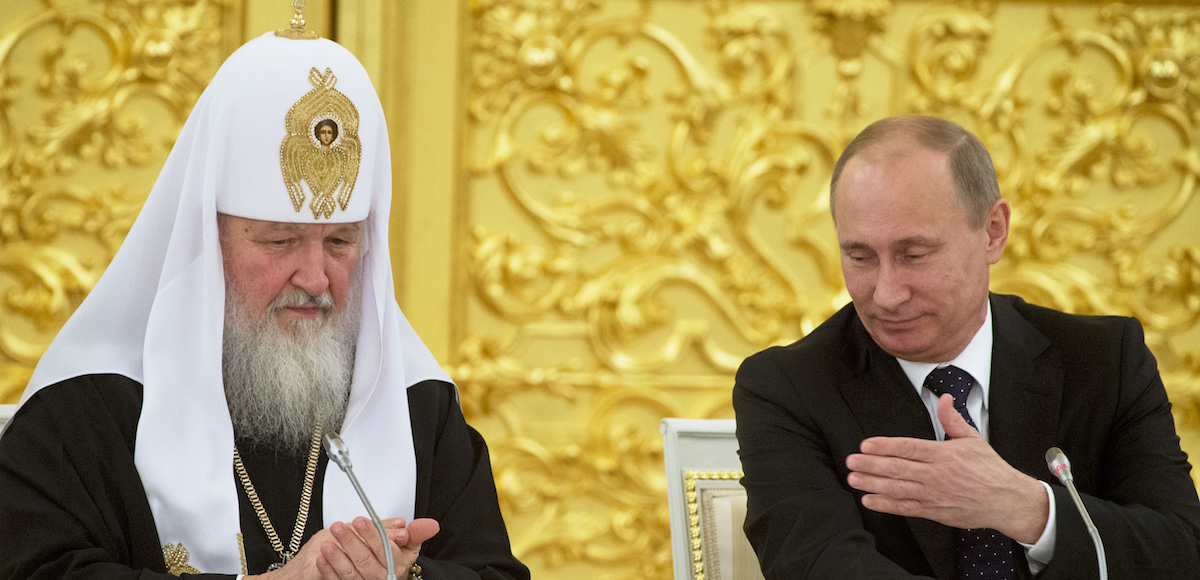 Russia's President Vladimir Putin (R) and Patriarch of Moscow and All Russia Kirill attend a meeting with Russian Orthodox church bishops in Moscow February 1, 2013, in this picture provided by Ria Novosti. (Photo: Reuters)