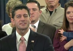 House Speaker Paul Ryan, R-Wis., holds up a post card form during the introduction of the Republican tax reform plan, dubbed the 