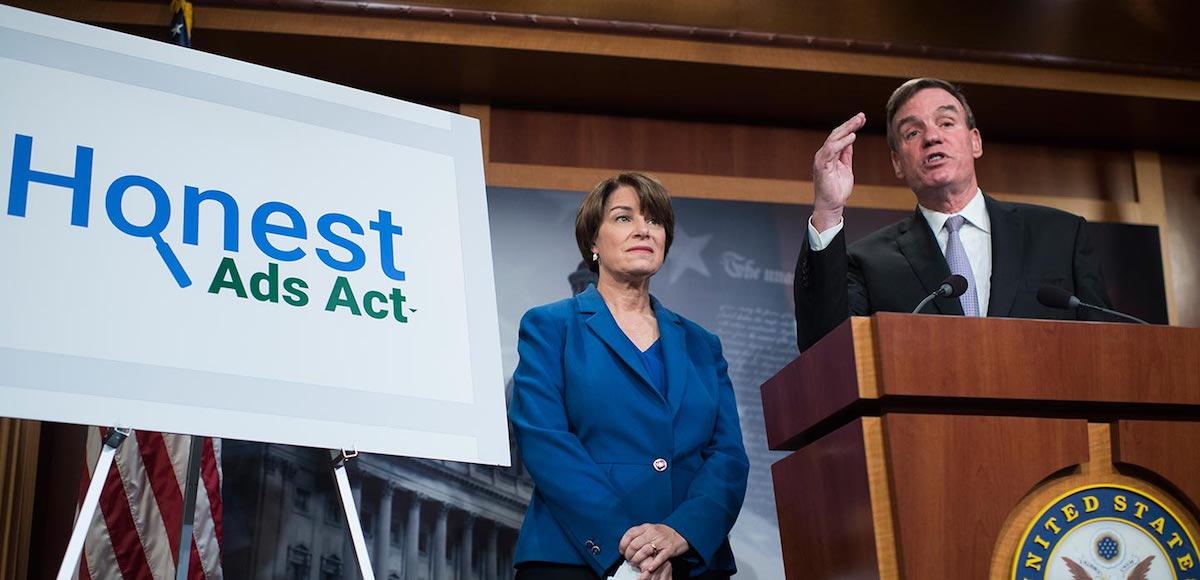 Sens. Amy Klobuchar, D-Minn., and Mark Warner, D-Va., conduct a news conference in the Capitol on the Honest Ads Act which aims to make online political ads more transparent on October 19, 2017. (Photo: AP)
