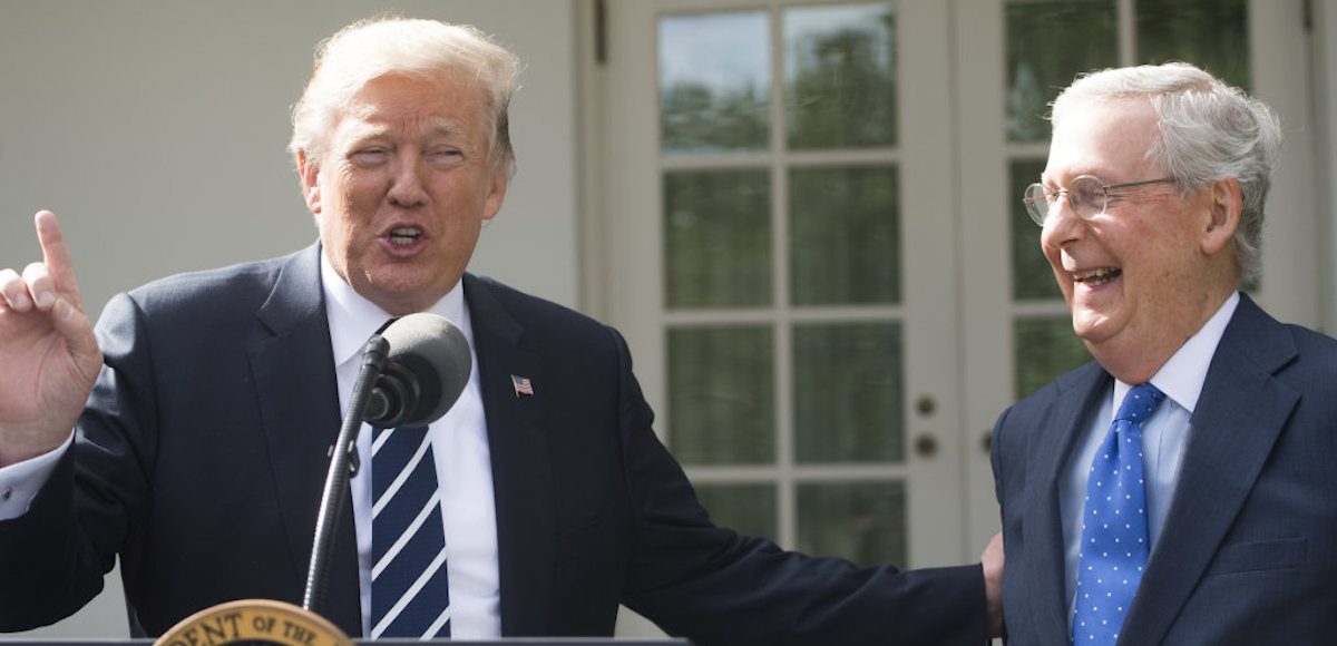 President Donald Trump speaks to the press alongside Senate Majority Leader Mitch McConnell (R), Republican of Kentucky, in the Rose Garden of the White House in Washington, DC, October 16, 2017. (Photo: Reuters)