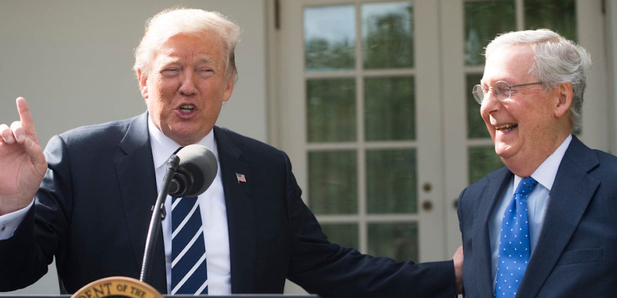 President Donald Trump speaks to the press alongside Senate Majority Leader Mitch McConnell (R), Republican of Kentucky, in the Rose Garden of the White House in Washington, DC, October 16, 2017. (Photo: Reuters)