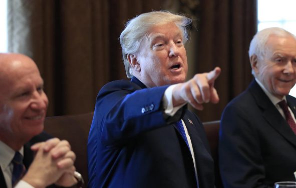 President Donald Trump, flanked by Rep. Kevin Brady, R-Texas, left, and Sen. Orrin Hatch, R-Utah, right, speaks during a bicameral meeting with lawmakers working on the tax cuts in the Cabinet Room of the White House in Washington, Wednesday, Dec. 13, 2017. (Photo: AP)