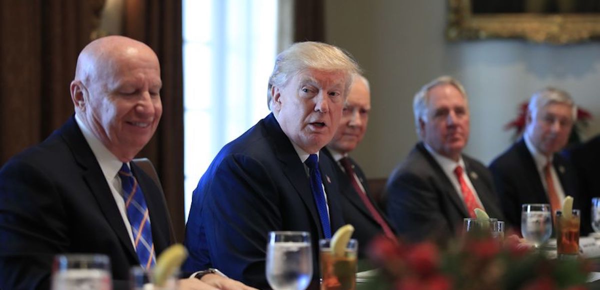 President Donald Trump speaks during a bicameral meeting with lawmakers working on the tax cuts in the Cabinet Meeting Room of the White House in Washington, Wednesday, Dec. 13, 2017. Attending the meeting are, from left, Rep. Kevin Brady, R-Texas; Trump; Sen. Orrin Hatch, R-Utah; Rep. John Shimkus, R-Ill., and Rep. Fred Upton, R-Mich. (AP Photo)