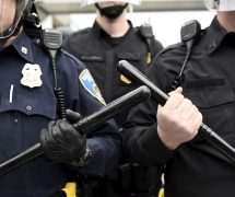 Police are seen as demonstrators gather near Camden Yards to protest against the death in police custody of Freddie Gray in Baltimore, Maryland, U.S. on April 25, 2015. (Photo: Reuters)