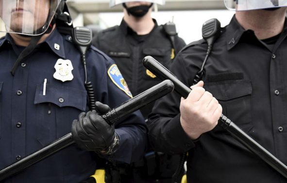 Police are seen as demonstrators gather near Camden Yards to protest against the death in police custody of Freddie Gray in Baltimore, Maryland, U.S. on April 25, 2015. (Photo: Reuters)