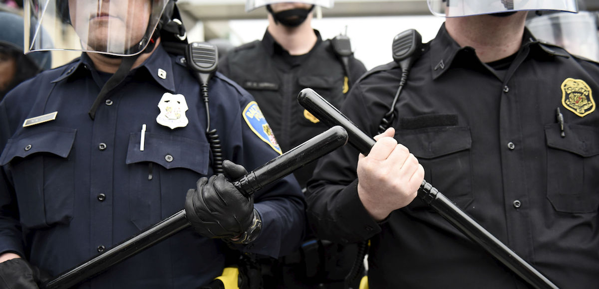 Police are seen as demonstrators gather near Camden Yards to protest against the death in police custody of Freddie Gray in Baltimore, Maryland, U.S. on April 25, 2015. (Photo: Reuters)