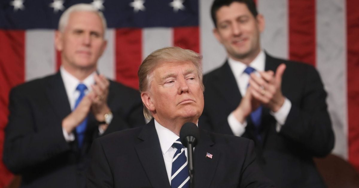 President Donald Trump addresses a joint session of Congress on Capitol Hill in Washington, Tuesday, Feb. 28, 2017, as Vice President Mike Pence and House Speaker Paul Ryan, R-Wis., listen and applaud. (Photo: AP)