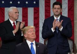 President Donald Trump delivers his first State of the Union address as Vice President Mike Pence, left, and House Speaker Paul Ryan, right, stand for applause.