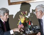Former U.S. Secretary of State John Kerry, left, and Palestinian President Mahmoud Abbas, right, talk at a meeting at the presidential compound in the West Bank city of Ramallah January 4, 2014. (Photo: Reuters)