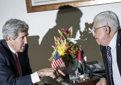 Former U.S. Secretary of State John Kerry, left, and Palestinian President Mahmoud Abbas, right, talk at a meeting at the presidential compound in the West Bank city of Ramallah January 4, 2014. (Photo: Reuters)