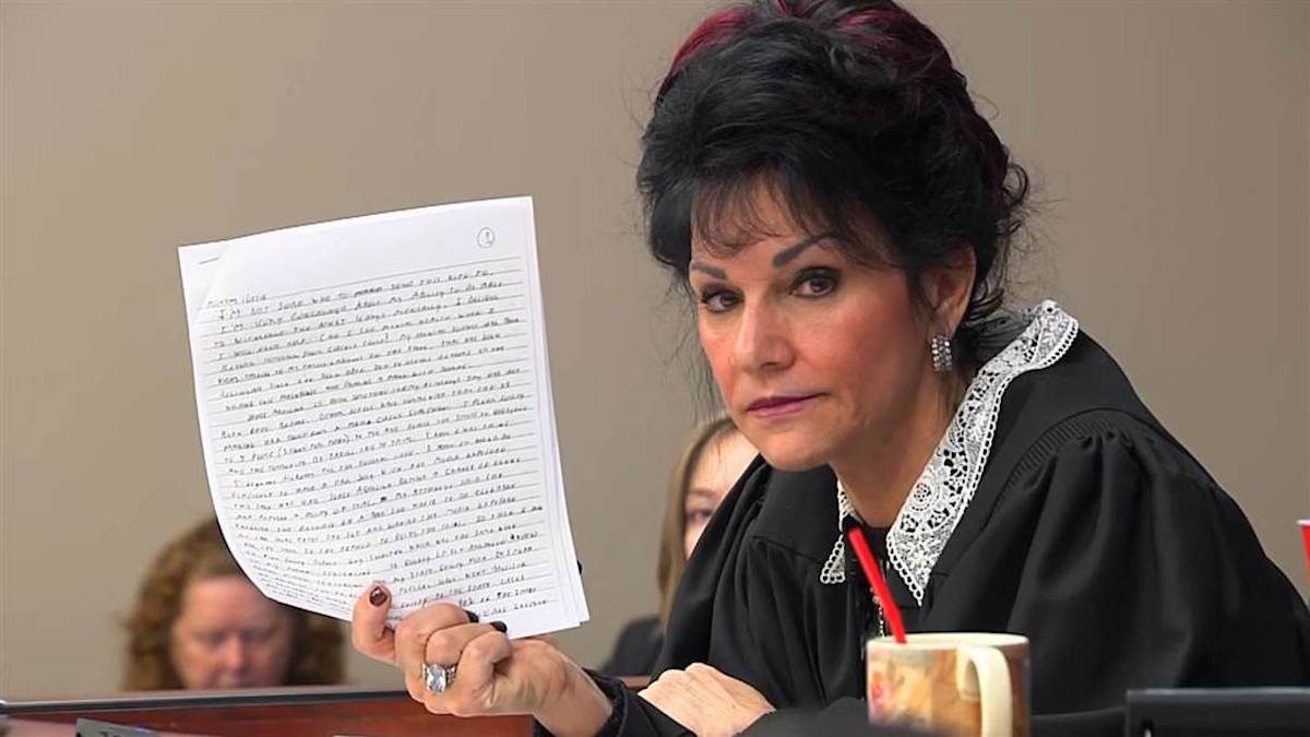 Circuit Court Judge Rosemarie Aquilina holds up a letter written by Larry Nassar, the former U.S.A. gymnastics doctor who plead guilty to molesting young girls.