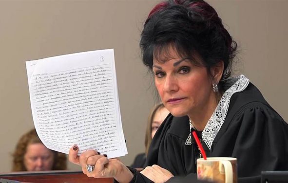 Circuit Court Judge Rosemarie Aquilina holds up a letter written by Larry Nassar, the former U.S.A. gymnastics doctor who plead guilty to molesting young girls.