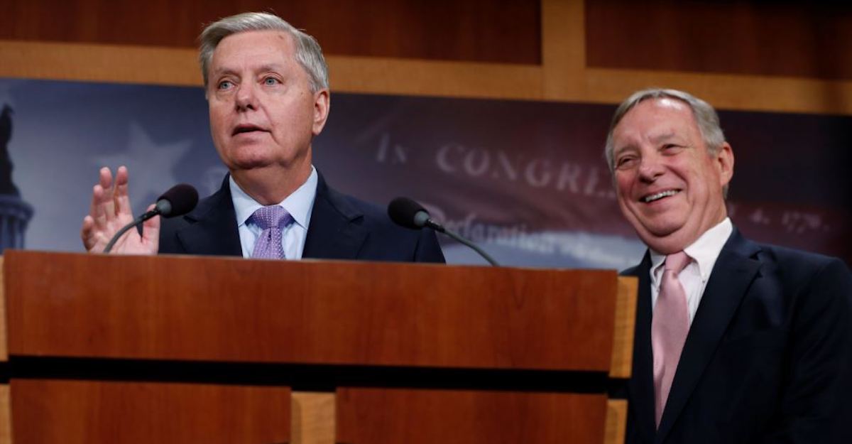 U.S. Sen. Lindsey Graham, R-S.C., flanked by Sen. Dick Durbin, D-Ill., talks about legislation for so-called "dreamer" immigrant children during a news conference at the U.S. Capitol in Washington, July 20, 2017. (Photo: Reuters)