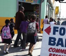 Regional coordinator Charles Evans (4th L) picks up children from school to take them to an after-school program at South Los Angeles Learning Center in Los Angeles, California March 16, 2011. (Photo: Reuters)