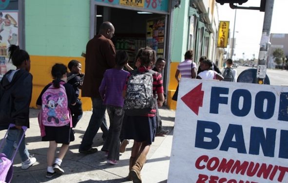 Regional coordinator Charles Evans (4th L) picks up children from school to take them to an after-school program at South Los Angeles Learning Center in Los Angeles, California March 16, 2011. (Photo: Reuters)