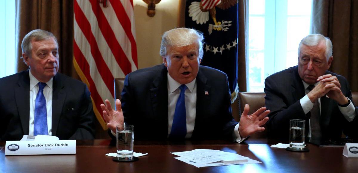 U.S. President Donald Trump, flanked by U.S. Senator Dick Durbin (D-IL) and Representative Steny Hoyer (D-MD), holds a bipartisan meeting with legislators on immigration reform at the White House in Washington, U.S. January 9, 2018. (Photo: Reuters)