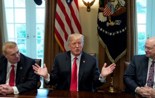 Chairman, CEO and President of Nucor John Ferriola and U.S. Steel CEO Dave Burritt flank U.S. President Donald Trump as he announces his administration will levy new tariffs to product U.S. steel and aluminum manufacturing companies. (Photo: Reuters)