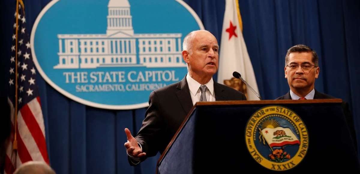 Democratic Governor Jerry Brown, left, and Democratic Attorney General Xavier Becerra, right, respond to a lawsuit filed against the state of California by the U.S. Department of Justice (DOJ) for refusing to comply with the federal government in enforcing immigration law.