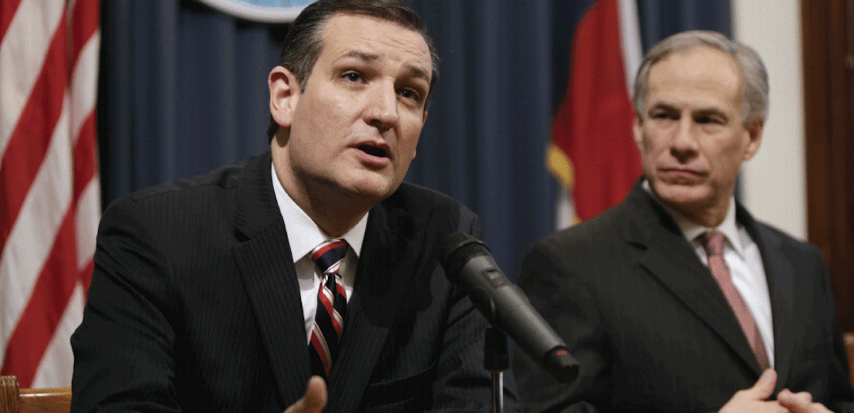 U.S. Sen. Ted Cruz, R-Texas, left, and Texas Republican Governor Greg Abbott, right, hold a joint press conference February 18, 2015 in Austin, Texas.
