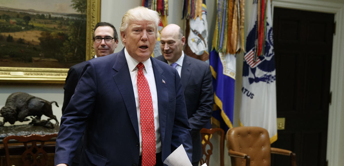 President Donald Trump, followed by Treasury Secretary Steven Mnuchin, left, and White House Economic Council Director Gary Cohn arrives for a meeting on the Federal budget, Wednesday, Feb. 22, 2017, in the Roosevelt Room of the White House in Washington. (AP Photo)