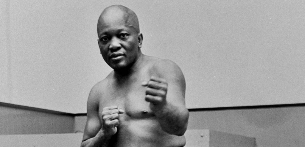 Boxer Jack Johnson, the first black world heavyweight champion, poses in New York City in 1932. (Photo: AP)