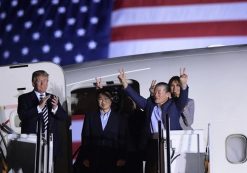 President Donald Trump, from left, greets Tony Kim, Kim Hak Song, seen in the shadow, and Kim Dong Chul, three Americans detained in North Korea for more than a year, as they arrive at Andrews Air Force Base in Md., Thursday, May 10, 2018. First lady Melania Trump also greet them at right. (Photo: AP)