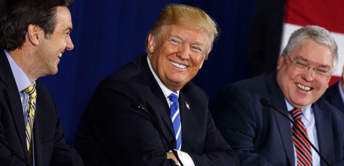 From left to right: Evan Jenkins, President Donald-Trump, and Patrick Morrisey smile during a roundtable discussion on tax reform on April 5, 2018. (Photo: AP)