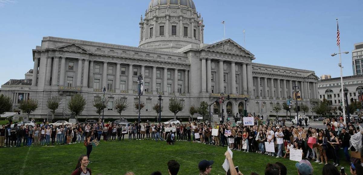 High school students gather to protest in opposition of Donald Trump's presidential election victory outside of City Hall in San Francisco in November 2016. (Photo: AP)