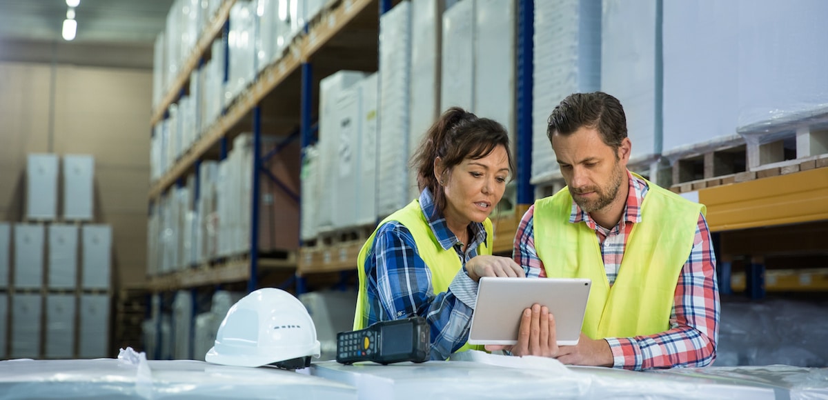 Employees have short meeting in the warehouse to check business inventory levels of goods. First in first out. (Photo: AdobeStock)