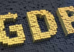 Gross domestic product (GDP) graphic concept with yellow square pixels on a black matrix background. (Photo: AdobeStock)