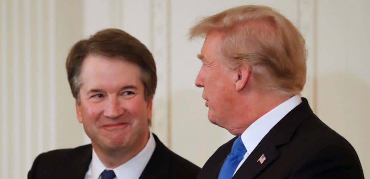 U.S. President Donald Trump and his nominee for the U.S. Supreme Court Judge Brett Kavanaugh talk during an announcement event in the East Room of the White House in Washington, U.S., July 9, 2018. (Photo: Reuters)